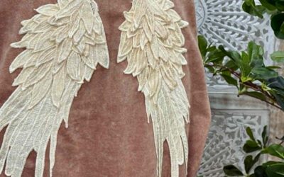 A No Sew Method For Attaching Angel Wing Appliques